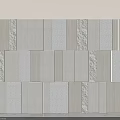 Modern Textured Background Wall with Light Colored Panels and Various Surface Patterns in Contemporary Design
