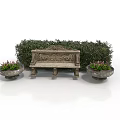 Stone Bench With Carved Details And Flower Pots In Garden Courtyard With Trimmed Bushes