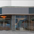 Modern Tea Shop Interior Design With Sleek Bar Counter And Cozy Seating
