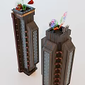 Two Tall Futuristic Tower Structures Featuring Geometric Patterns And Red Vertical Accents
