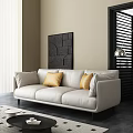 White Three-Seater Sofa With Yellow and Light Gray Pillows Beige Wall Black Geometric Art