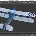 Vintage Biplane Fighter Model with Green Body Red Propeller and Wing Roundels