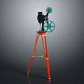 Vintage Commercial Film Projector On Orange Tripod With Green Reels For Professional Screening