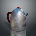 Stylish Silver Teapot With Red Handle And Textured Surface On Reflective Base 3d model
