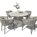 Modern Rattan Round Table and Chair Set With Metal Frame and Potted Plants
