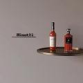 Stylish Wine Bottles Displayed On Metal Tray Against Gray Wall Interior