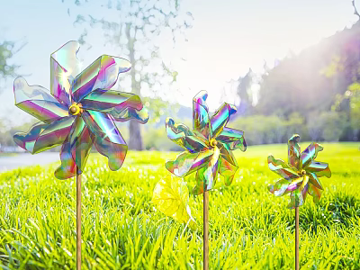 Colorful Outdoor Decorative Windmills Standing In Green Garden Grass With Sunlight 3d model