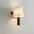 Modern Wooden Wall Lamp With Fabric Lampshade On Light Wall