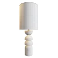 Black Wooden Base Table Lamp With Beige Fabric Shade And Stacked Round Design