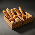 Fresh Assorted Bread In Wooden Crates With Baguettes And Round Rolls On Dark Background