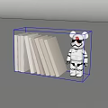 Stack of Gray Books Next to White Black Bear Figurine With Red Markings