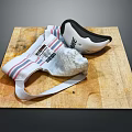 Stylish White Shoes With Red Blue Stripes Placed On Wooden Board Surface