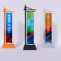 Three Vertical Billboards With Colorful Banners And Different Colored Bases For Outdoor Advertising