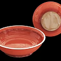 Red Ceramic Bowls With White Rim And Metal Rivets On Back View