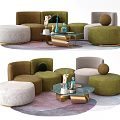 Modern Sectional Sofa Setup With Green Beige Ottomans Glass Coffee Table Decorative Items On Rug
