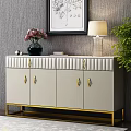 Elegant White Console Cabinet With Gold Handles Legs Vase Lamp And Decorative Painting