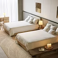 Hotel Guest Room Featuring Twin Beds White Linens Pillows Table Lamps And Decorative Paintings