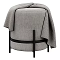Two Round Gray And Light Gray Ottoman Stools With Gold Metal Frame And Decorative Bands