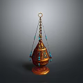 Ornamental Metal Home Decor Piece With Carved Design Blue Beads Hanging Chains And Circular Base