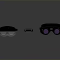 Modern Black VR Headsets with Purple Lenses and Small Accessory