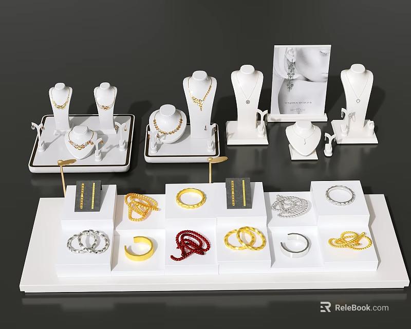 Elegant Jewelry Display With Gold Silver Red Rings Bracelets On White Trays 3d model 