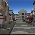 Commercial Street Featuring European Style Buildings Outdoor Dining Areas And Cobblestone Pavement