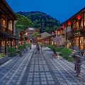 Bustling Traditional Commercial Street With Ancient Buildings Red Lanterns Stone Path And Pedestrians