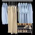 Light Blue Shirts And Beige Pants On Hangers With Shoes On Rack