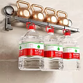 Soft Cotton Towels Hanging On Metal Rack With Gold Dumbbells And Water Jugs
