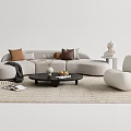 Modern Curved Sofa and Coffee Table Set With Throw Pillows Accent Chair and Woven Rug