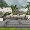 Tranquil Courtyard Garden With Cushioned Bench Fire Pit Lush Plants And Stone Path