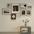 Stylish Photo Wall With Multiple Black And White Frames In Minimalist Interior 3d model