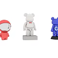 Collection of Red Astronaut Character and White Blue Bear Creature Figurines with Logos