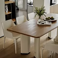 Modern Dining Table Set With Wooden Top White Chairs Green Plant And Fruit Platter Decor