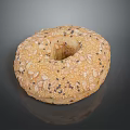 Freshly Baked Seeded Bagel Topped With Sesame Oat Poppy Seeds And Golden Crusty Exterior