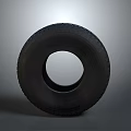 High Quality Black Rubber Tire With Detailed Tread Pattern Isolated On Gray Background