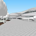 Modern Curved Roof Building Exterior With Landscaping Trees And Water Area