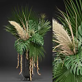 Lush Decorative Plant Arrangement With Monstera Palm Leaves And Pampas Grass And Hanging Elements
