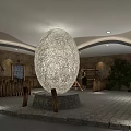 Large Woven Spherical Sculpture in Indoor Space with Stone Walls Wooden Railings and Green Plants