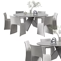 Modern Round Dining Table Set with Gray Chairs and Decorative Tabletop Items 3d model