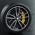 Car Wheel Featuring Modern Alloy Rim And Yellow Brake Caliper Black Tire Design