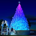 Giant Colorful Light Up Tree Decoration With Archway And Night Sky Background