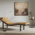 Modern Leather Chaise Lounge with Black Metal Frame Floor Lamp Green Plant and Abstract Painting