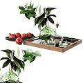 Green Glass Vase with Fresh Flowers and Wooden Tray with Pomegranates and Glass Cups