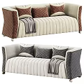 Two Seater Sofa With Beige Velvet Upholstery Brown Quilted Accents Gray Pillows And Throw Blanket