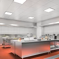 Commercial Kitchen Interior With Stainless Steel Worktables White Cabinets Ceiling Lights And Red Tile Flooring