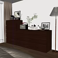 Brown Wooden Dresser With Drawers Potted Plant Photo Frame And Decor Items