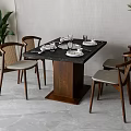 Wooden Dining Table And Chairs Set With Black Tabletop Woven Backrests And Green Plants