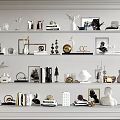 Stylish Decorative Ornaments Set On Shelves With Sculptures Vases Frames And Candle Holders