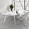 White Conference Table With Laptop Notebooks White Chairs And Green Plant In Modern Office
